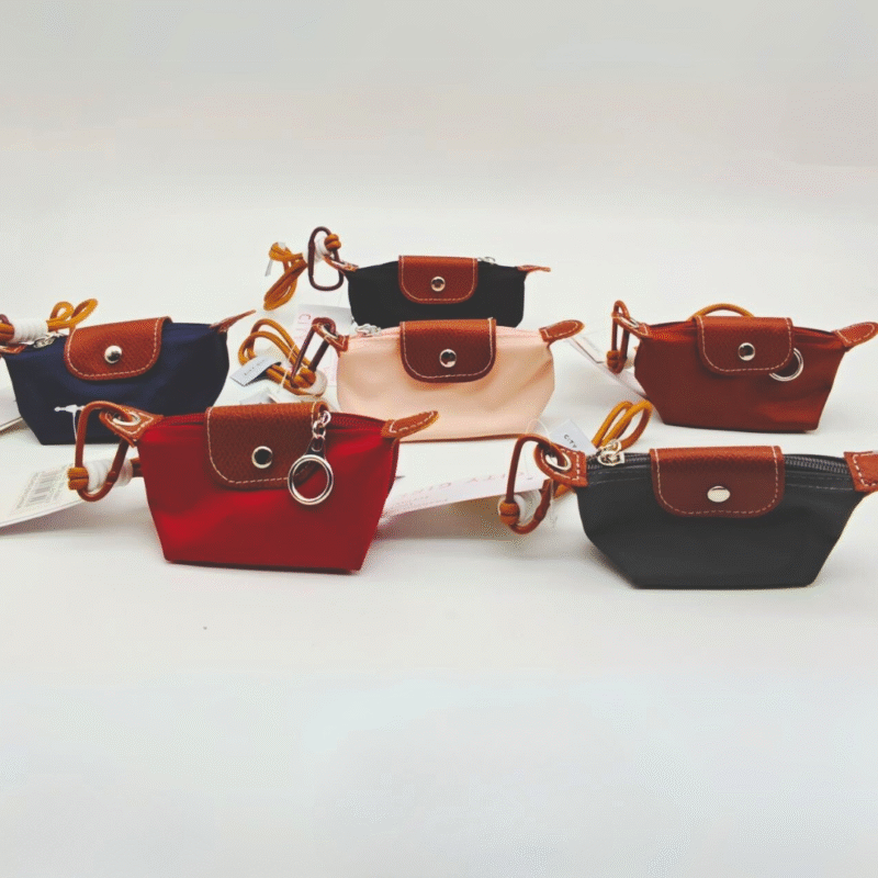 LLAVEROS CHARM MONEDERO - CITY GIRL