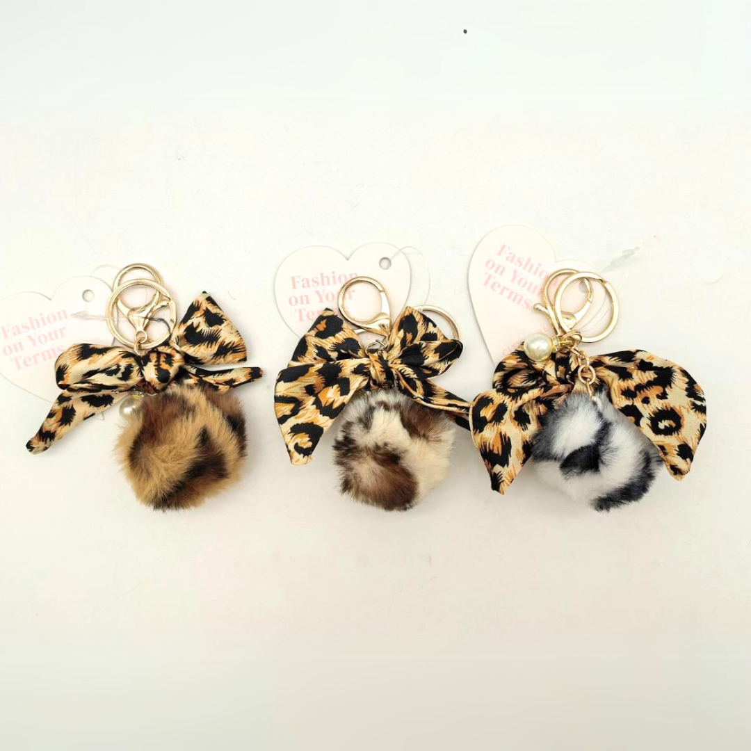 LLAVEROS CHARMS POMPÓN ANIMAL PRINT – PAQUETE 12u