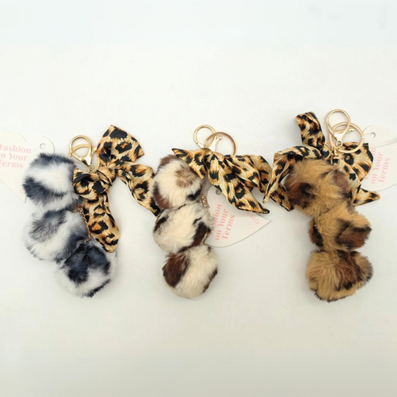 LLAVEROS CHARMS POMPÓN TRIPLE ANIMAL PRINT – PAQUETE 12u