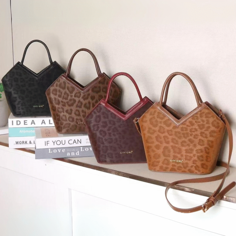 CARTERA DE MANO ANIMAL PRINT - CITY GIRL