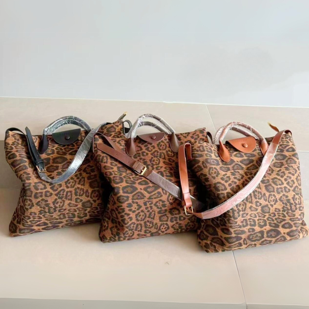 CARTERA ANIMAL PRINT - CITY GIRL
