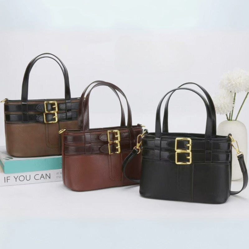 CARTERA DE MANO CON HEBILLAS - CITY GIRL