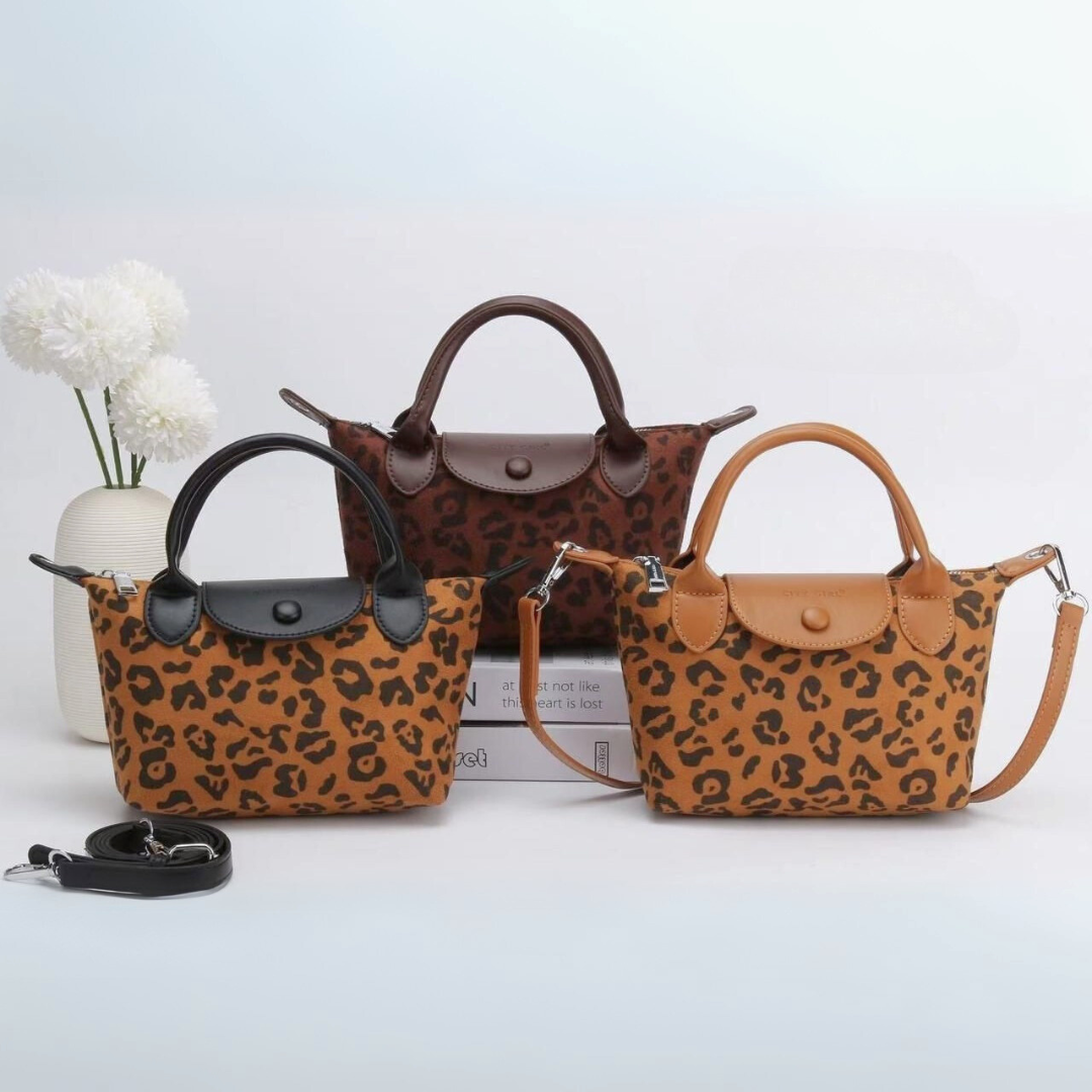 CARTERA DE MANO ANIMAL PRINT - CITY GIRL